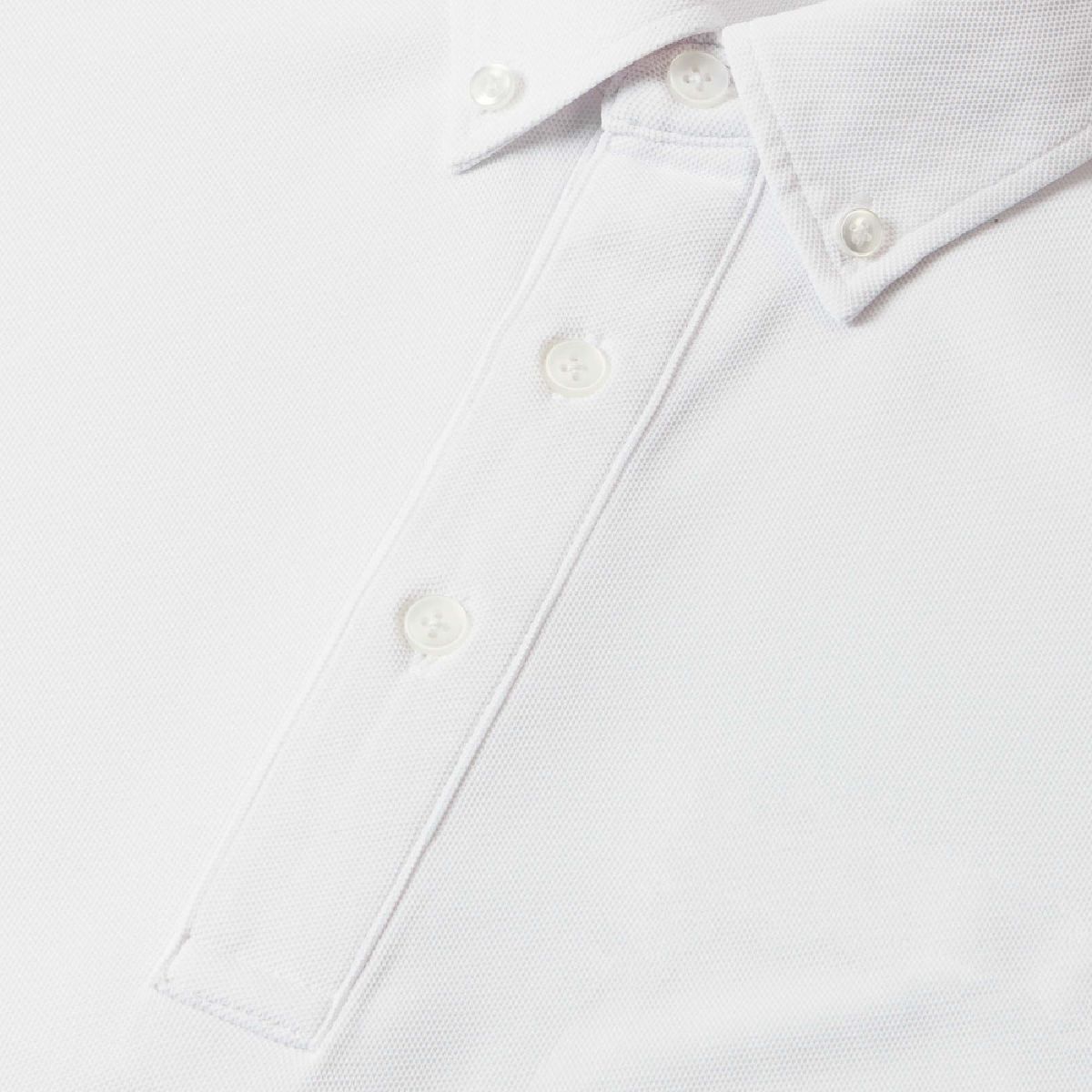 Use a milky white button for colors other than black and navy