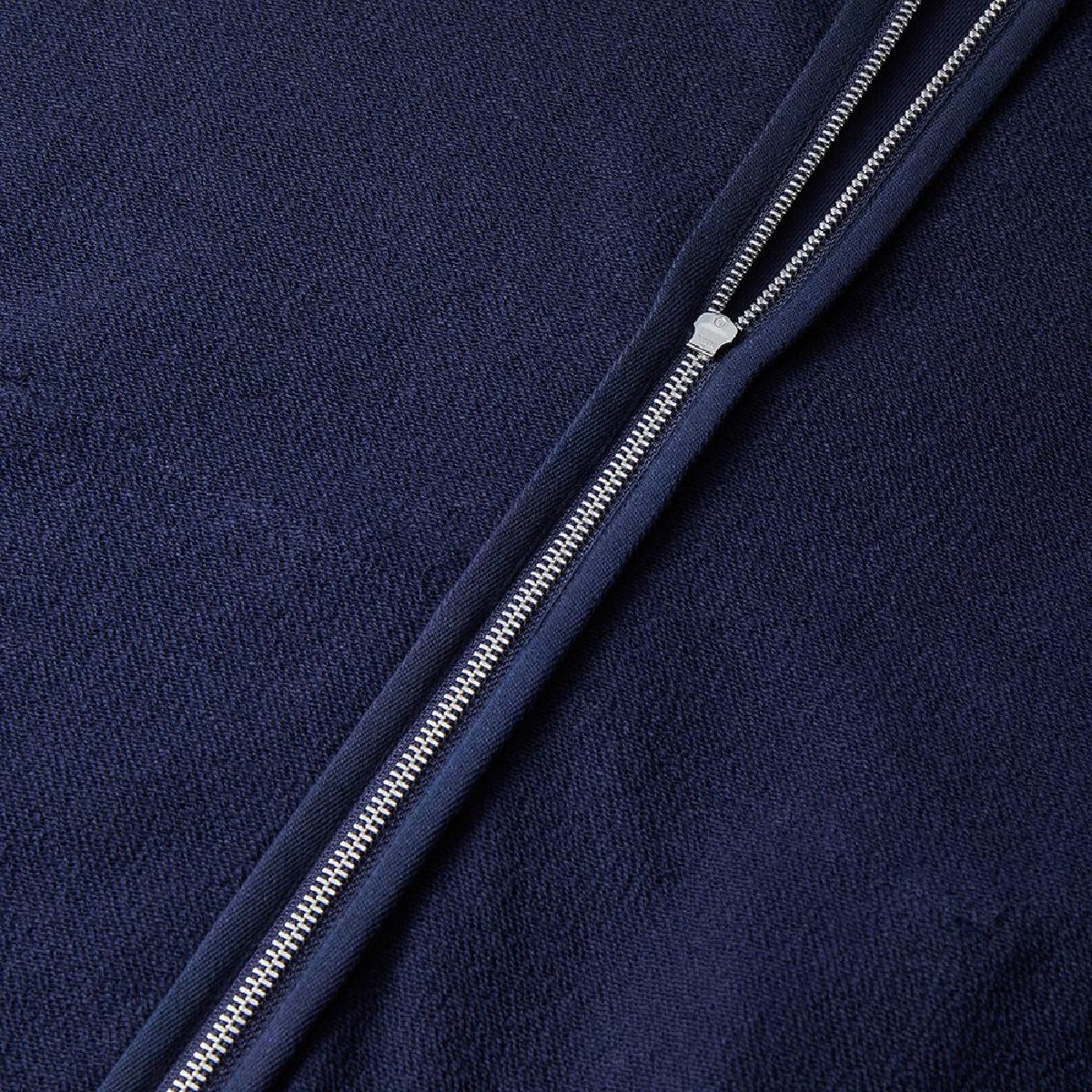 The back side of the zipper tape is beautifully finished by piping