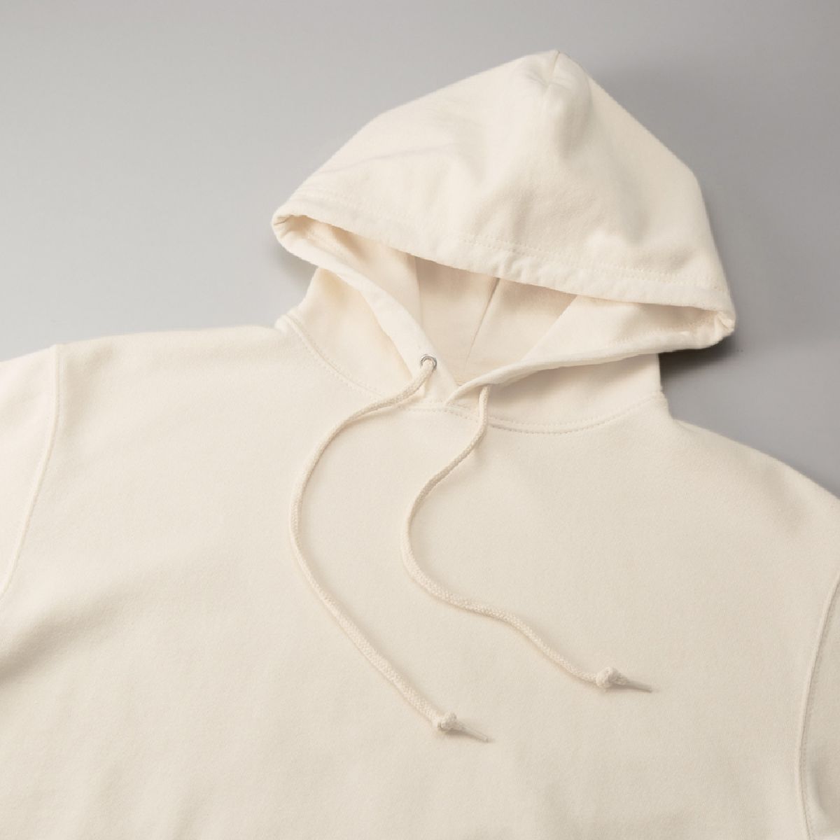 Features a three-dimensional double hood