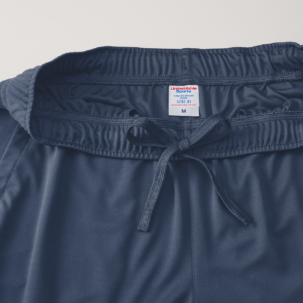 The waist has a flat string with adjustable body fabric color matching (inside)