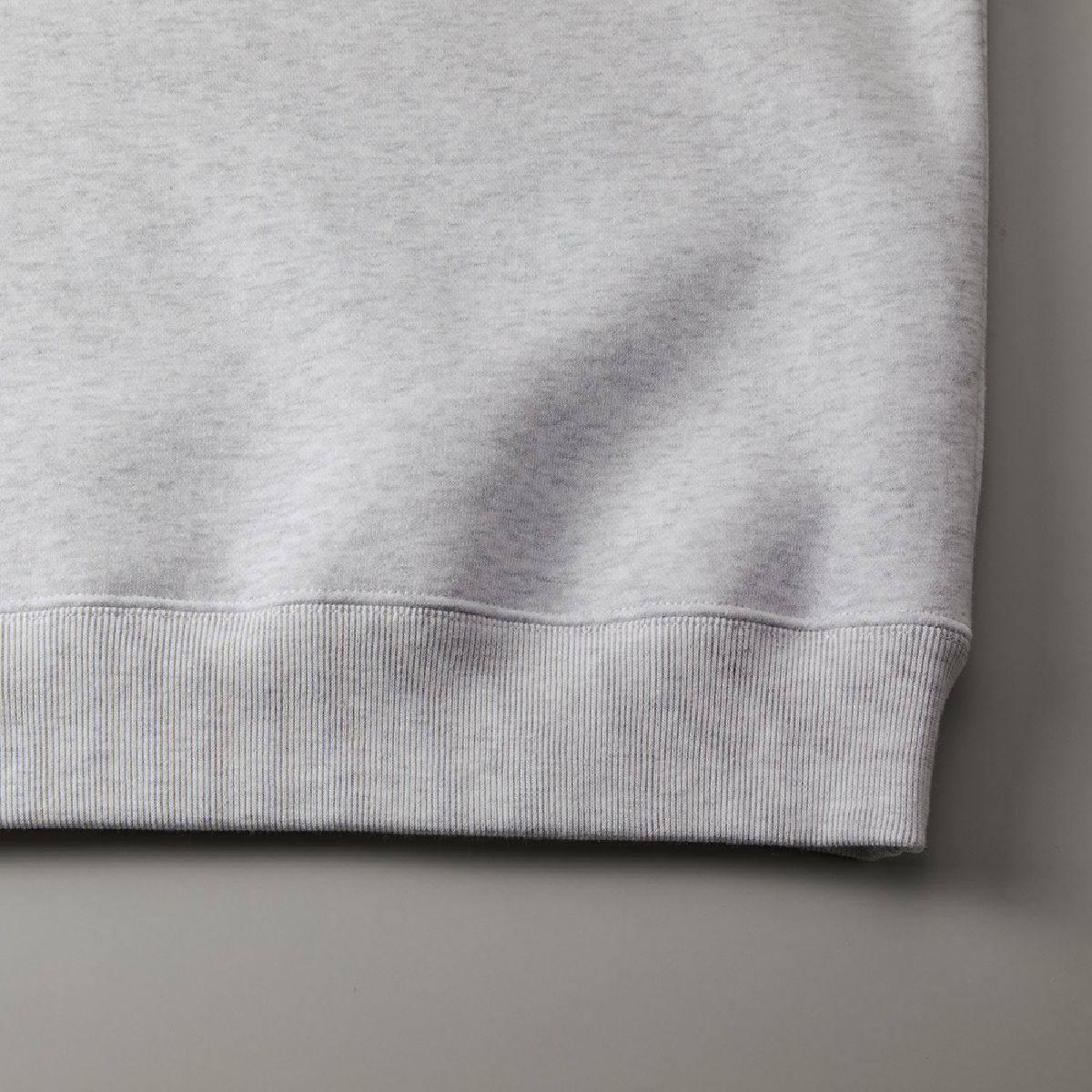 The ribs at the hem and the seam line of the body are robust two needles