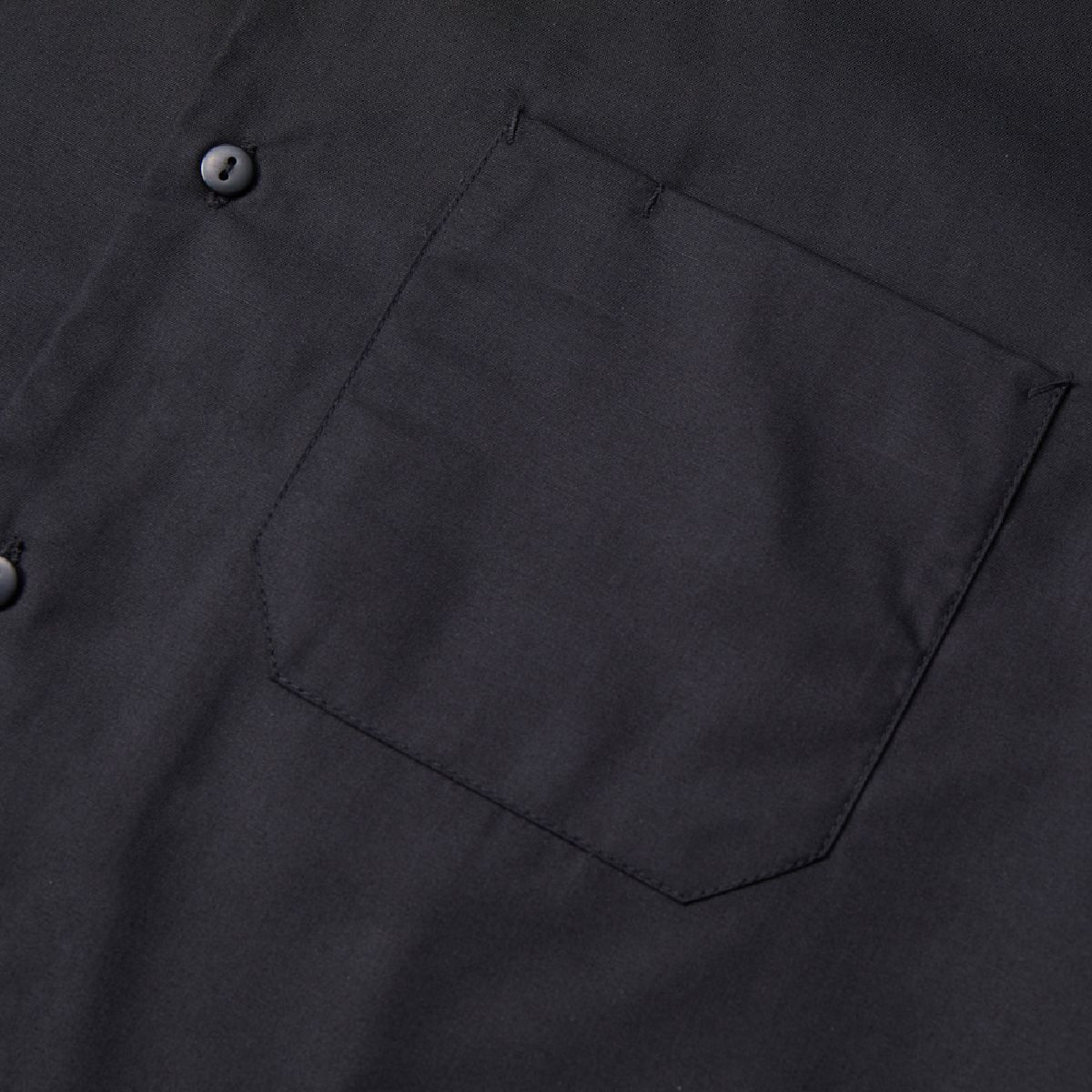 There is a pocket on the left chest (with a pen holder).