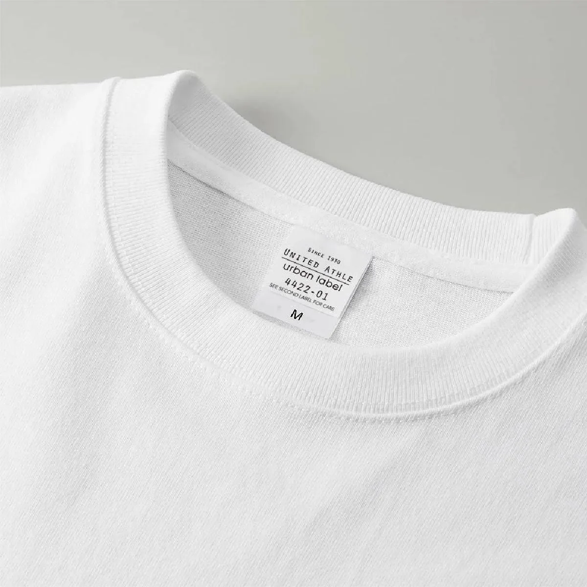 The neck ribbing is finished with durable double stitching.