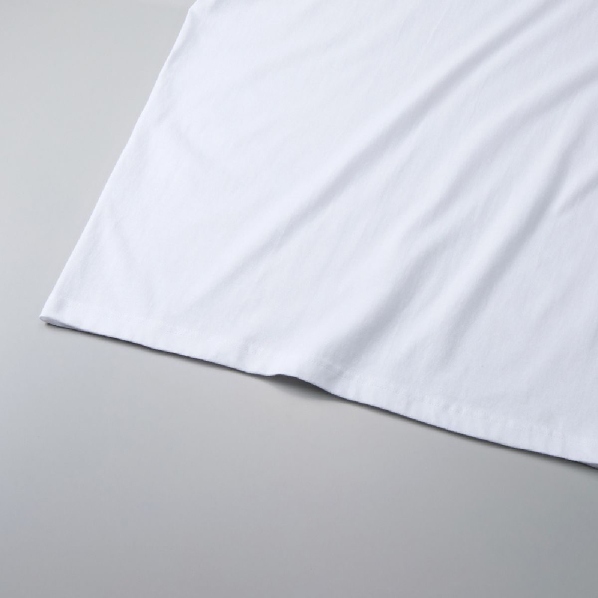 The hem is finished with a double needle stitch.