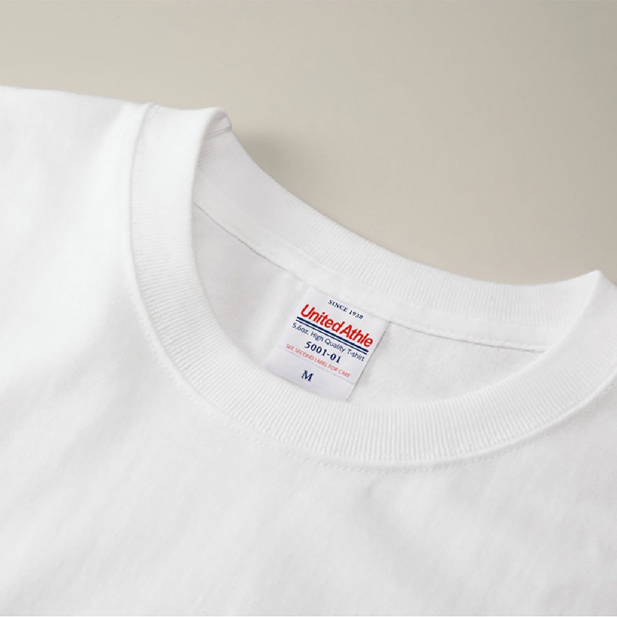 The neck ribbing is finished with durable double stitching.