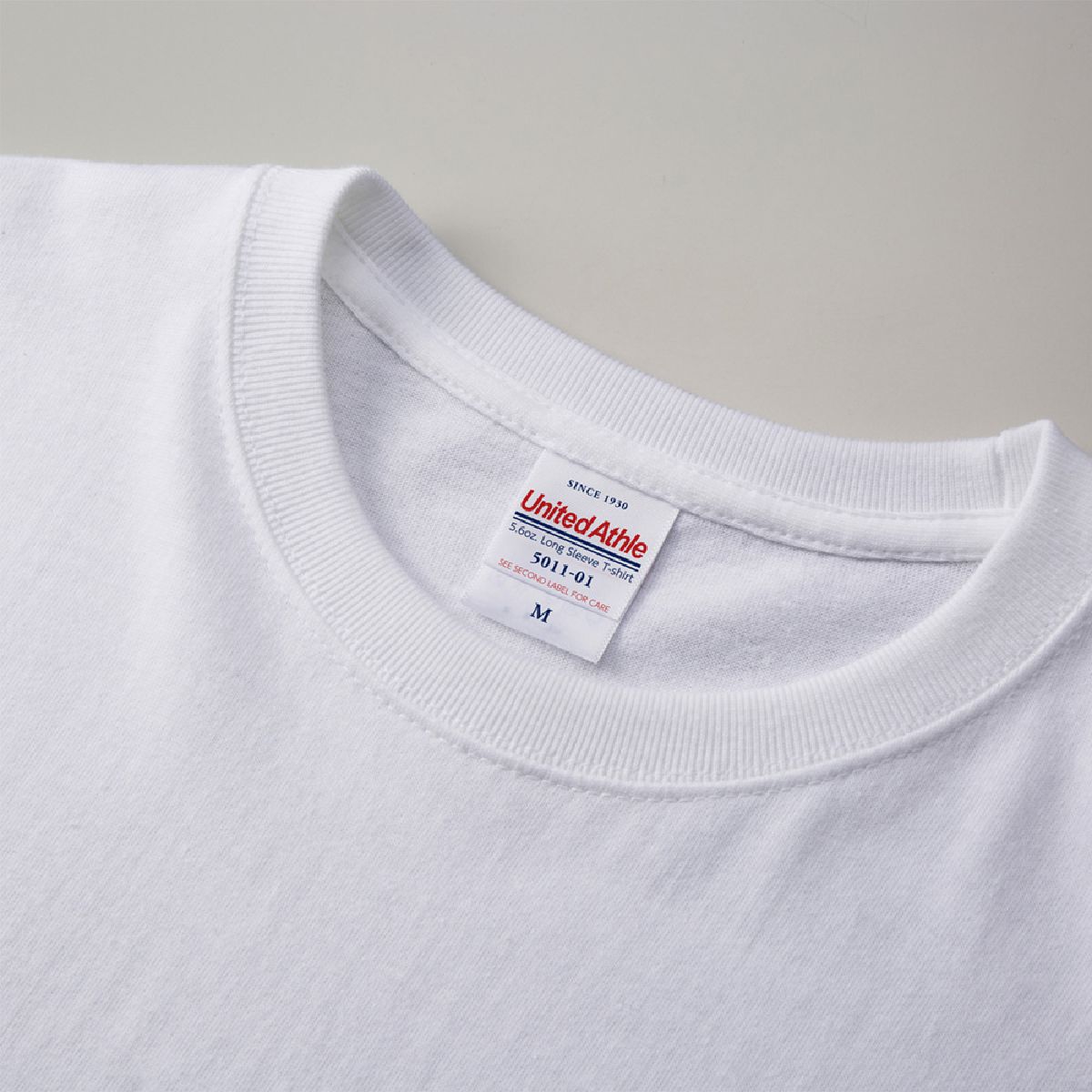 The neck ribbing is finished with durable double stitching.