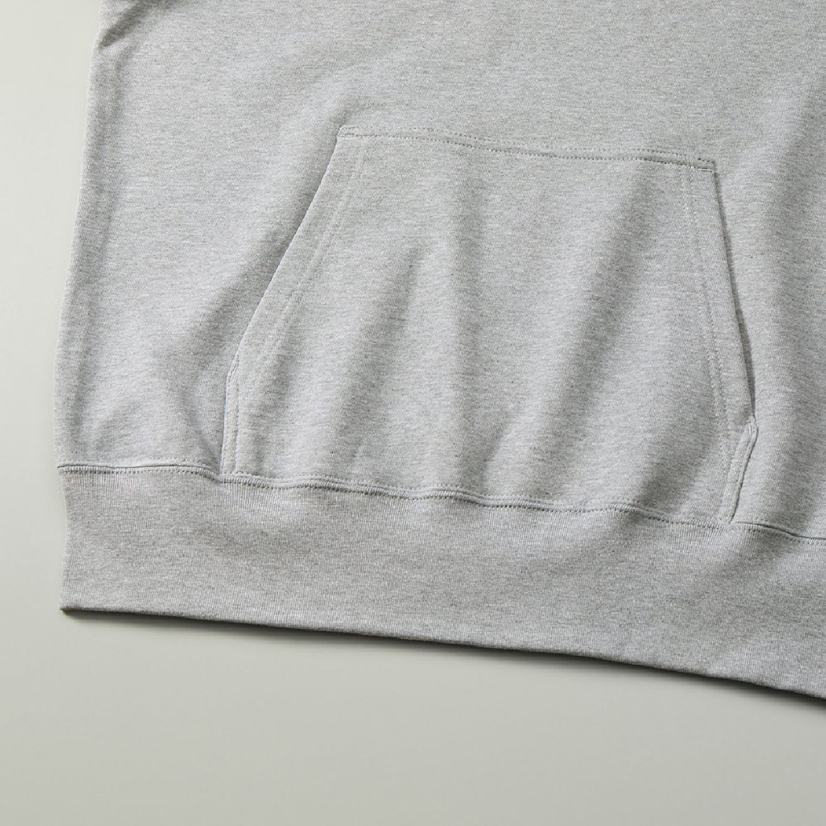 Features a kangaroo pocket and ribbed cuffs.