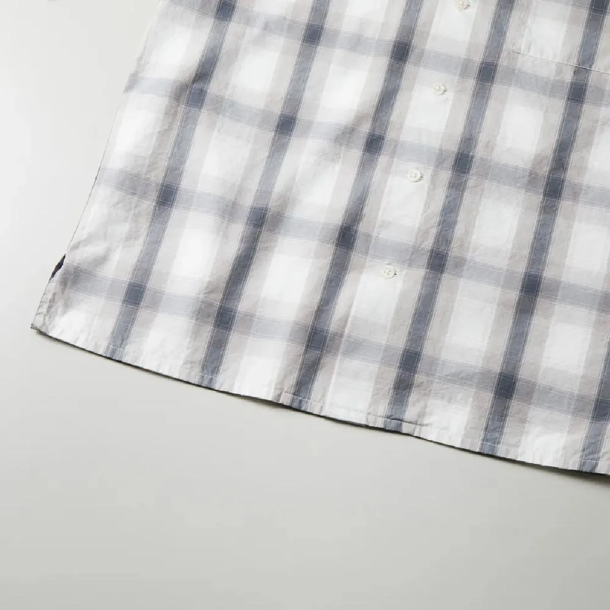 The hem is finished with a single needle.