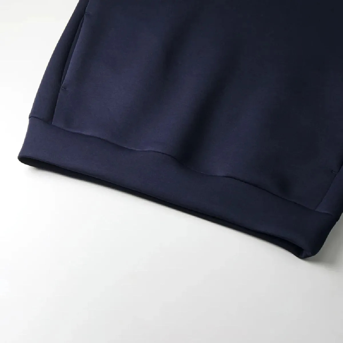 The hem is made from the same fabric as the body of the garment.