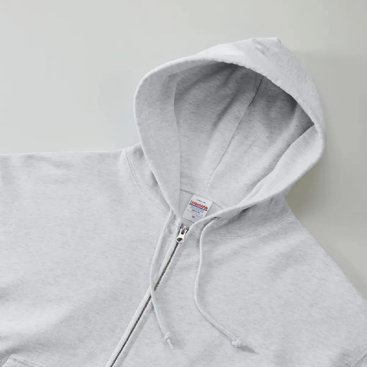 It features a large, eye-catching double hood.