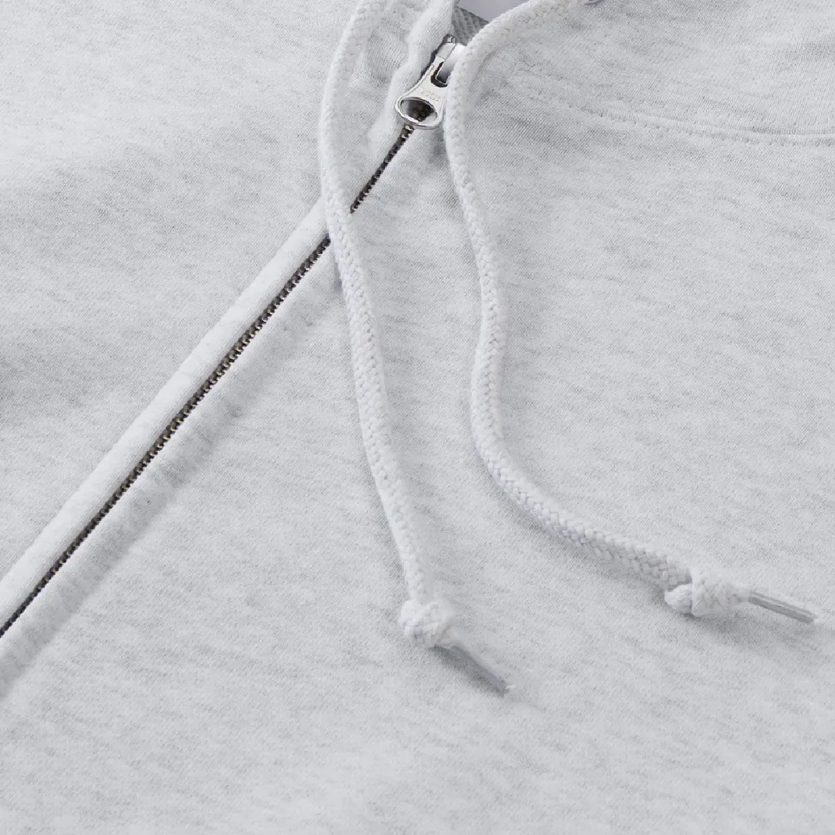 The hood drawstring is a round cord in the same color as the body, with a cell tip finish at the end.