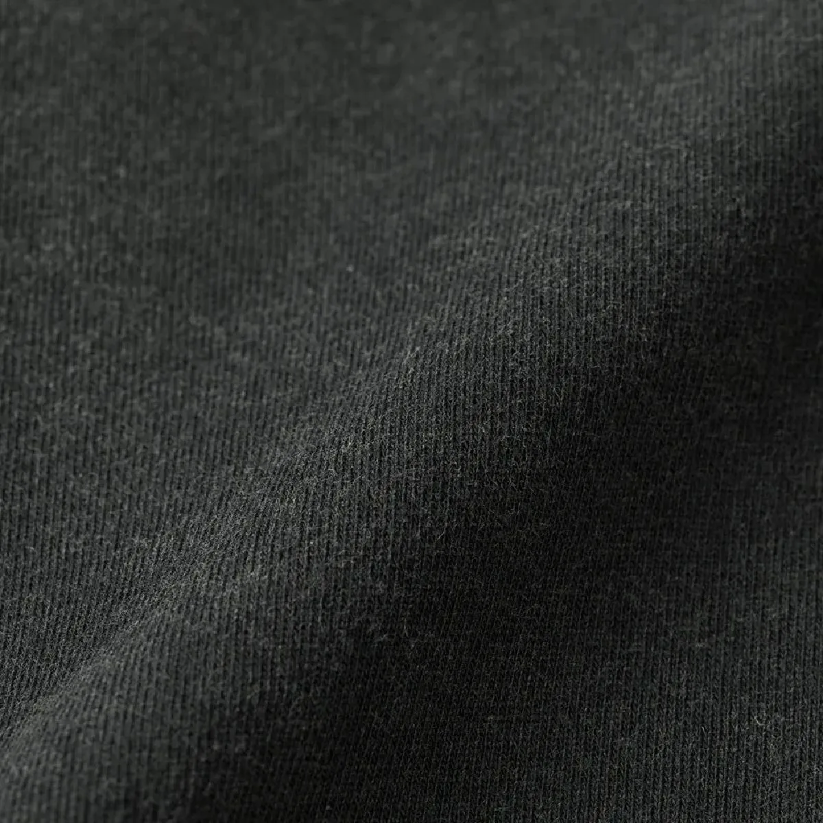 The product undergoes a bio-wash process to create a distressed look and feel, giving it the appearance of vintage clothing.