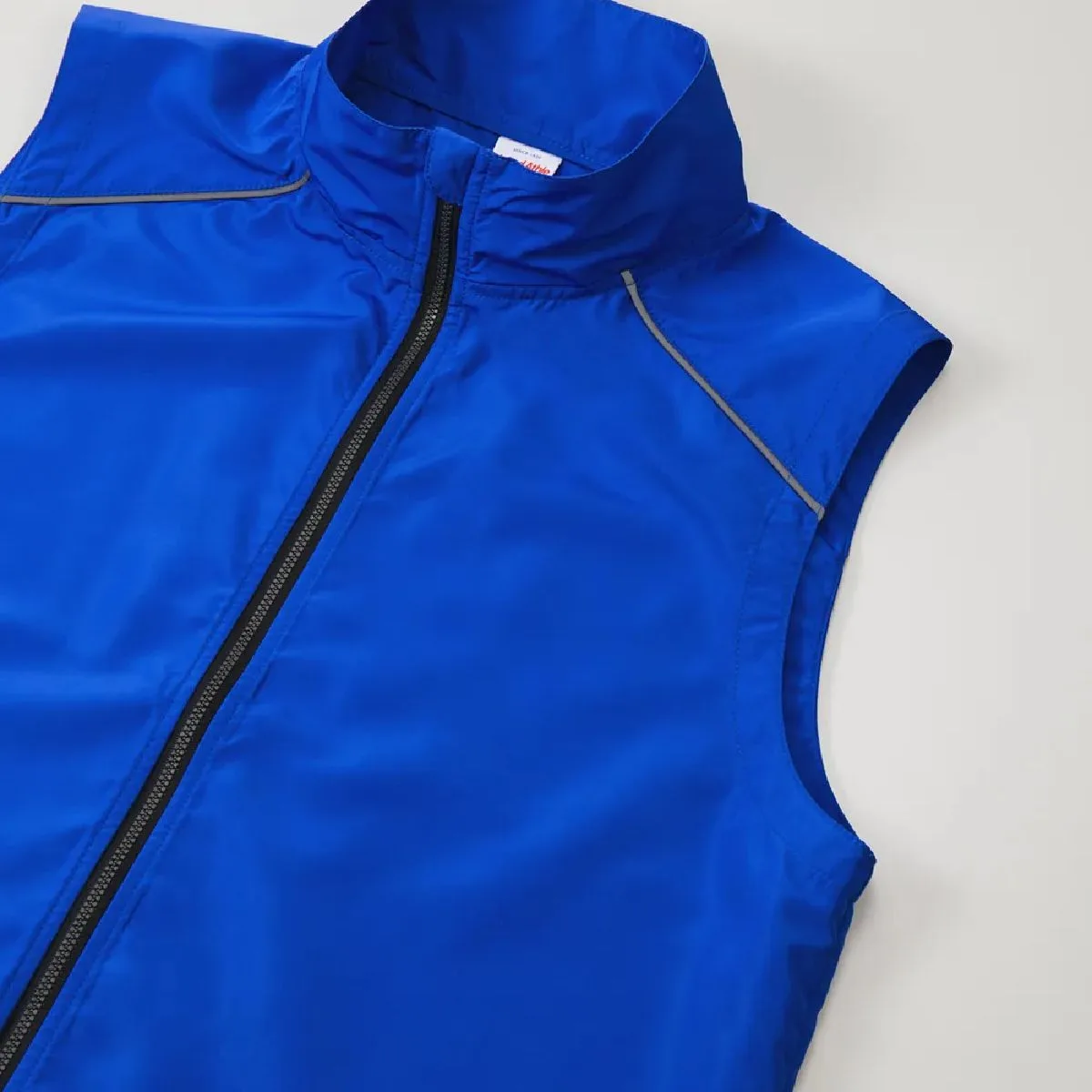 Armholes designed to reduce bulkiness when layering and ensure ease of movement.