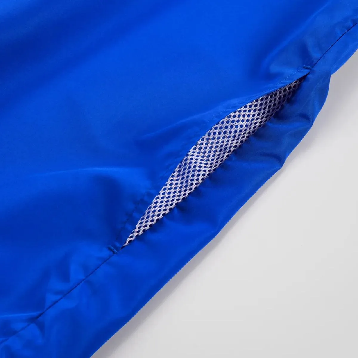 Features seam pockets on both sides.