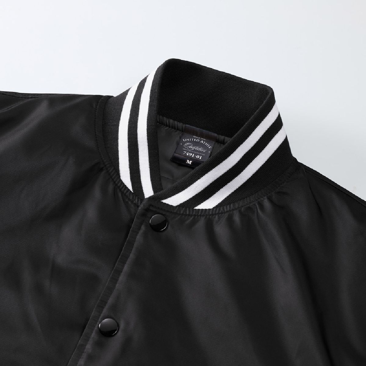 The collar features a ribbed design, and Color No. 2001 and 4001 have a striped ribbed finish.